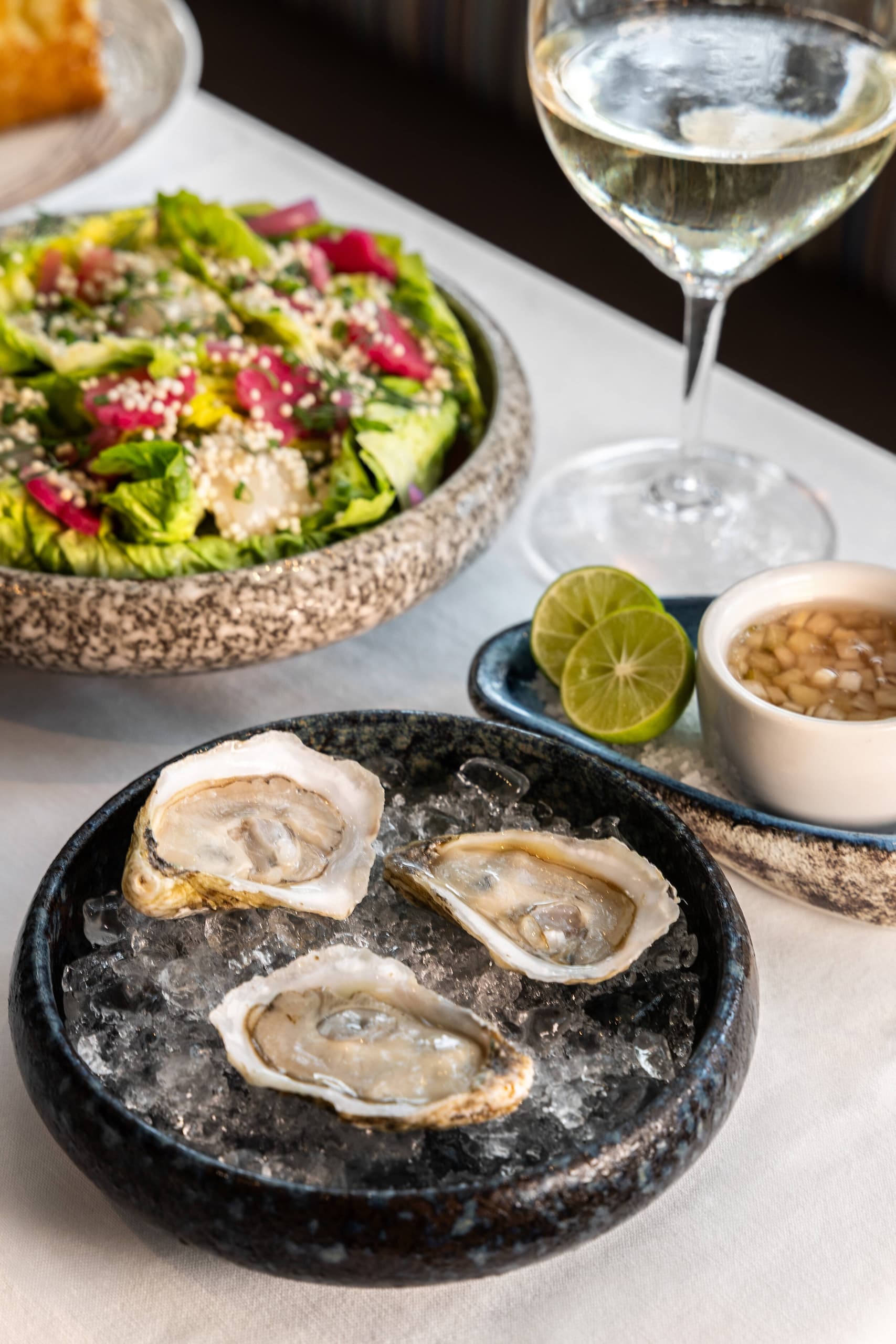 Fresh oysters on the half shell with mignonette and white wine at Cafe Marquesa, Key West