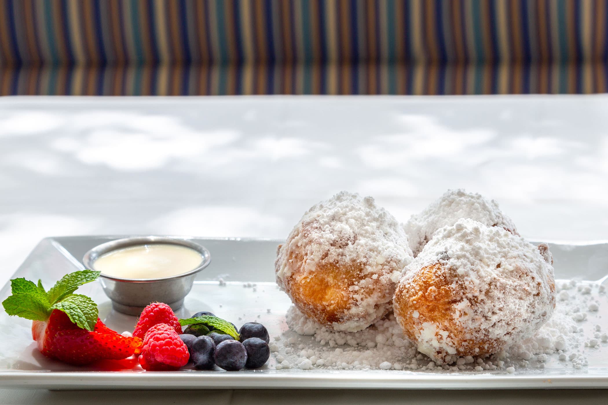 Dine Cafe Marquesa Beignets with fruit