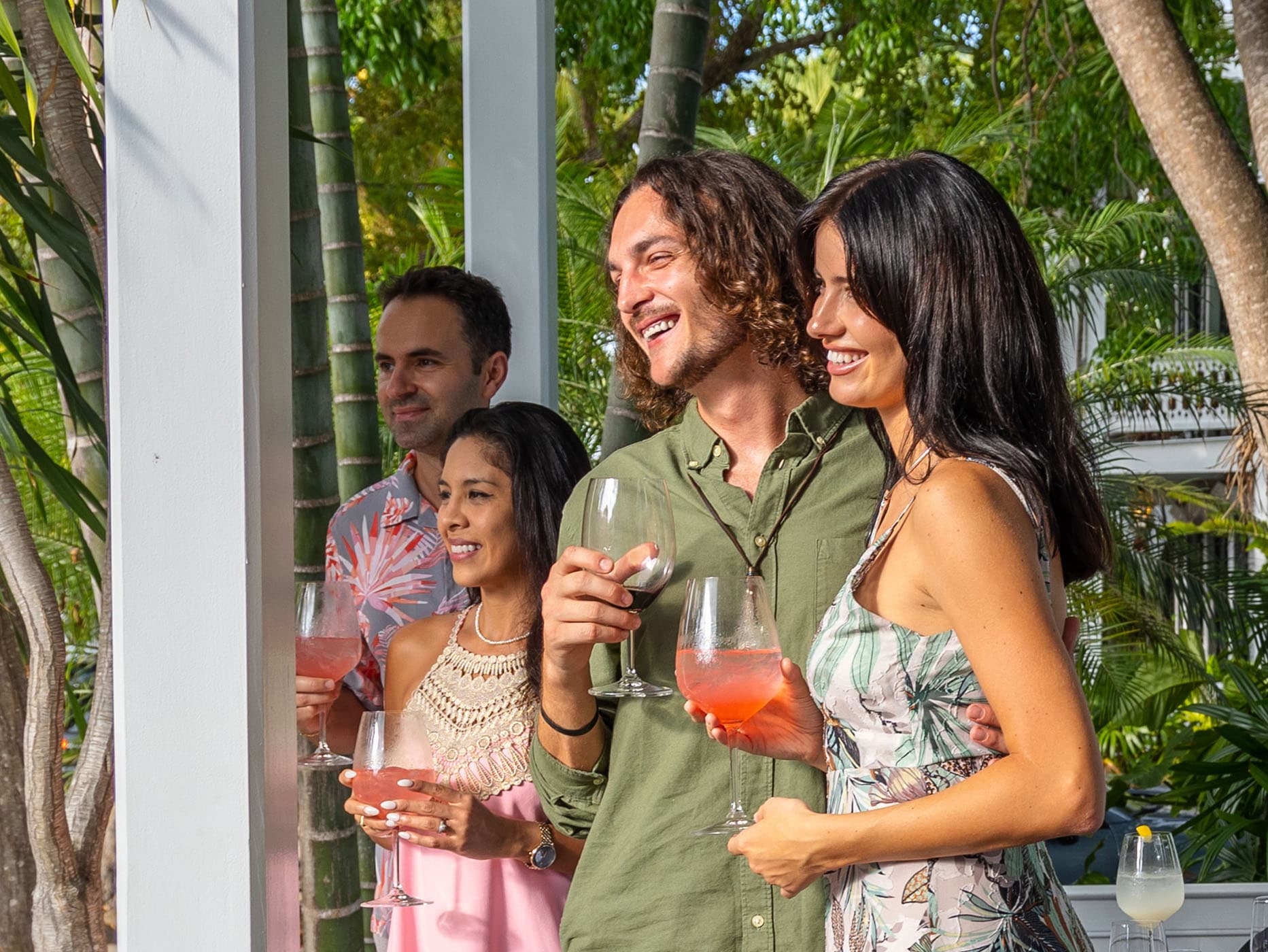 A group of people enjoying the Marquesa golden hour with some drinks