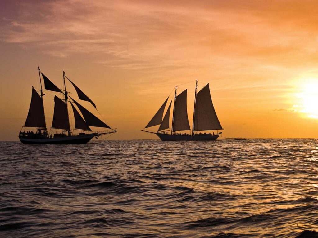 Sailboats In The Sunset.